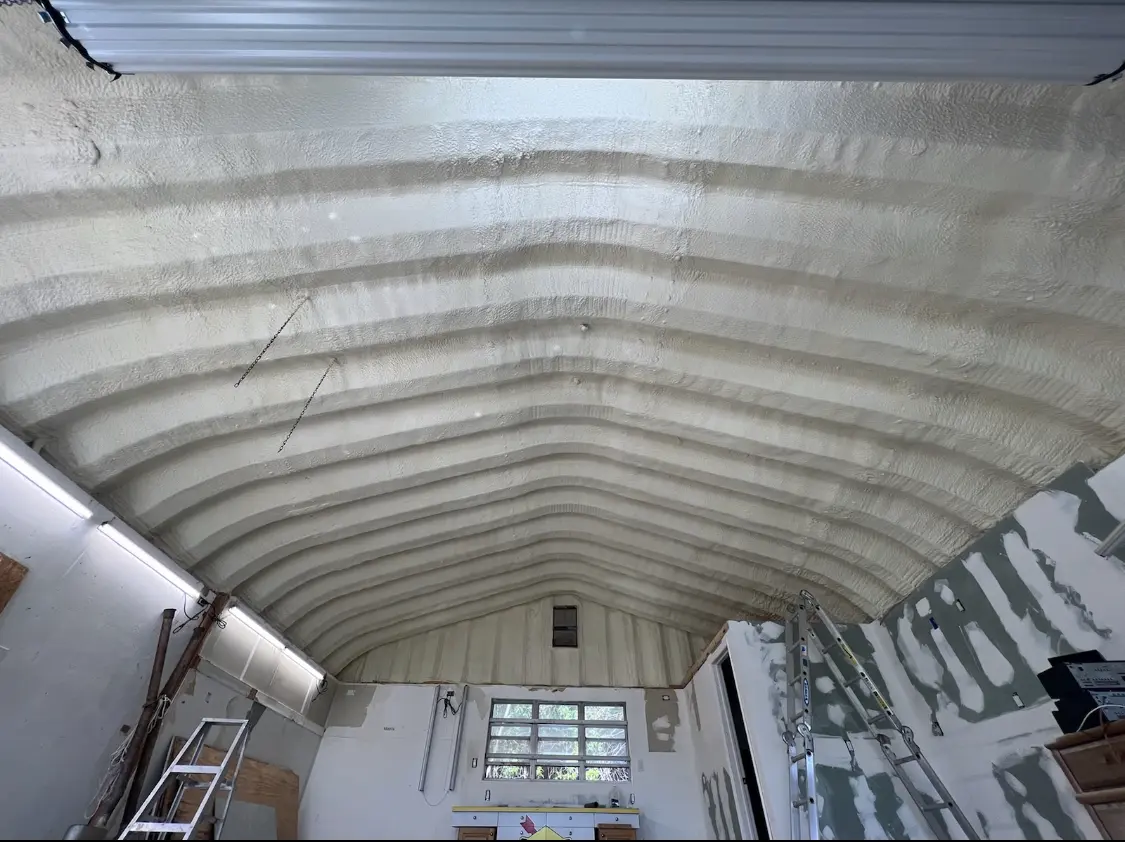 Spray polyurethane foam applied to the underside of a metal roof deck in Alum Rock